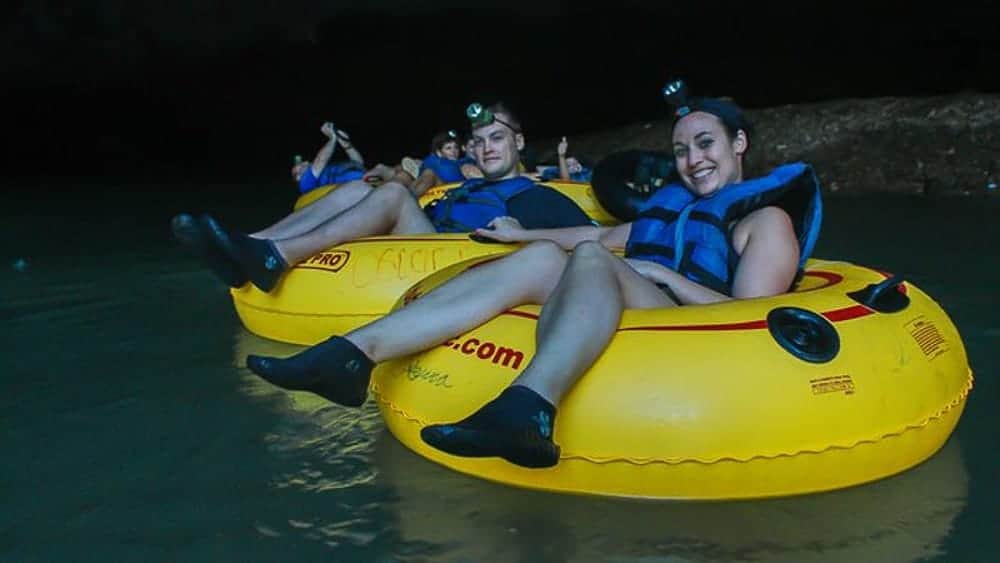 Guests cave tubing through Belize river caves on Xunantunich Mayan Ruin and Cave Tubing from San Ignacio