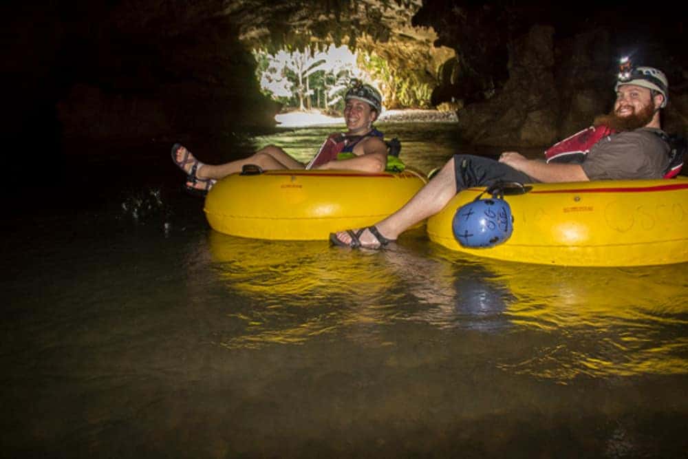 Guests cave tubing through Belize river caves on Xunantunich Mayan Ruin and Cave Tubing from San Ignacio