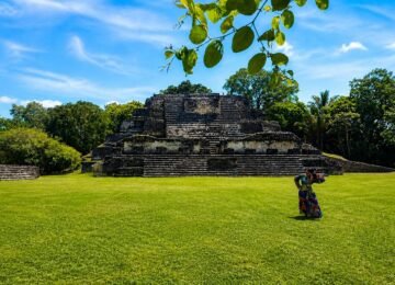 Social sharing image of Altun Ha Maya ruins in Belize with a bright tropical landscape.