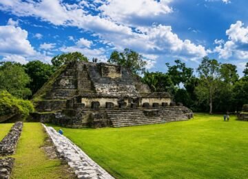 Altun Ha Mayan Ruins in Belize shown in a clean, centered tourism card image.