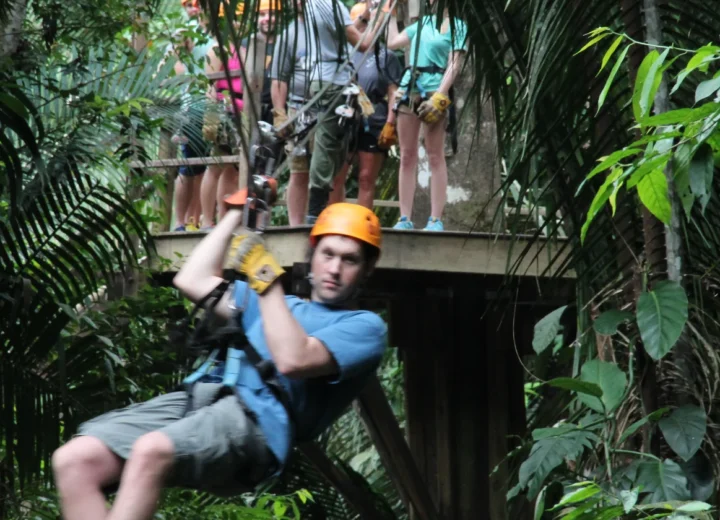 Guest ziplining in Belize on a Xunantunich adventure from Caye Caulker