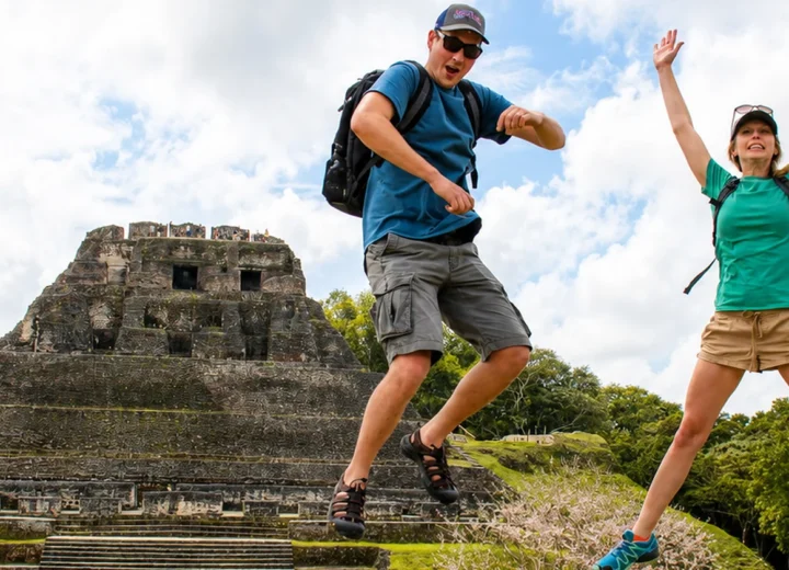 Travelers enjoying Xunantunich Maya ruins on a private day tour from Placencia