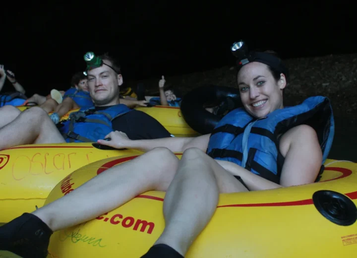Guests cave tubing in Belize on a Xunantunich tour from Belize City