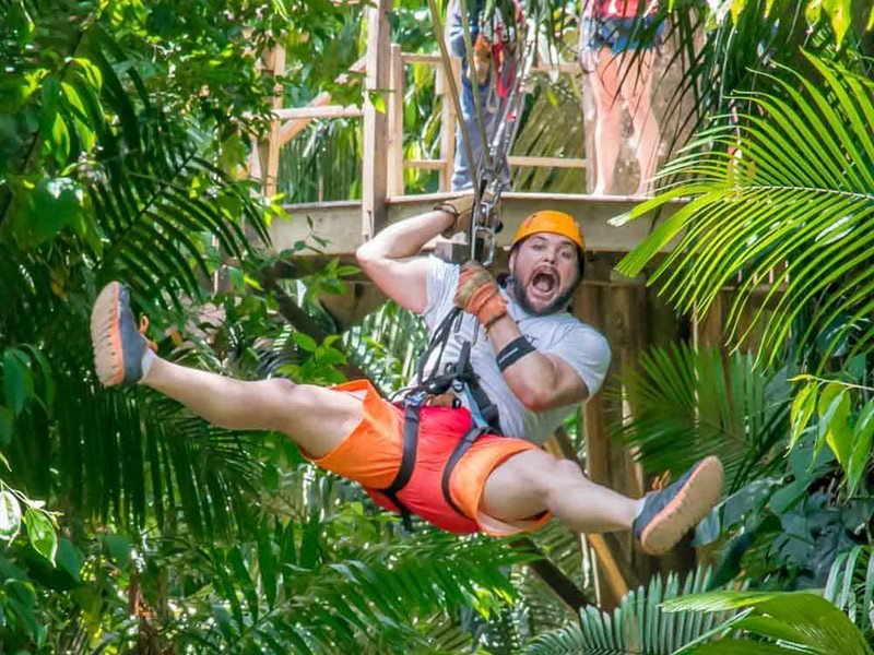 Belize zipline adventure paired with cave tubing from Belize City